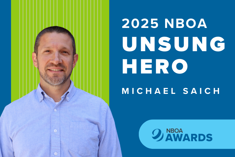 Headshot of Michael Saich against a blue and green NBOA-branded background