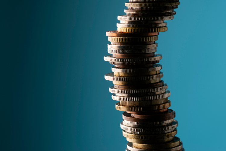 stock image of coins on blue background